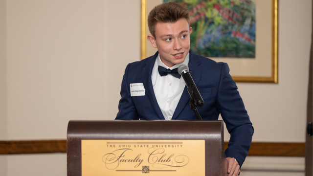 Arón Olegnowicz-Cruz speaking at the Faculty Club