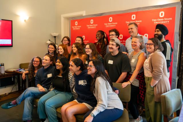 I hit submit fall 2024 group together in front of red ohio state backdrop