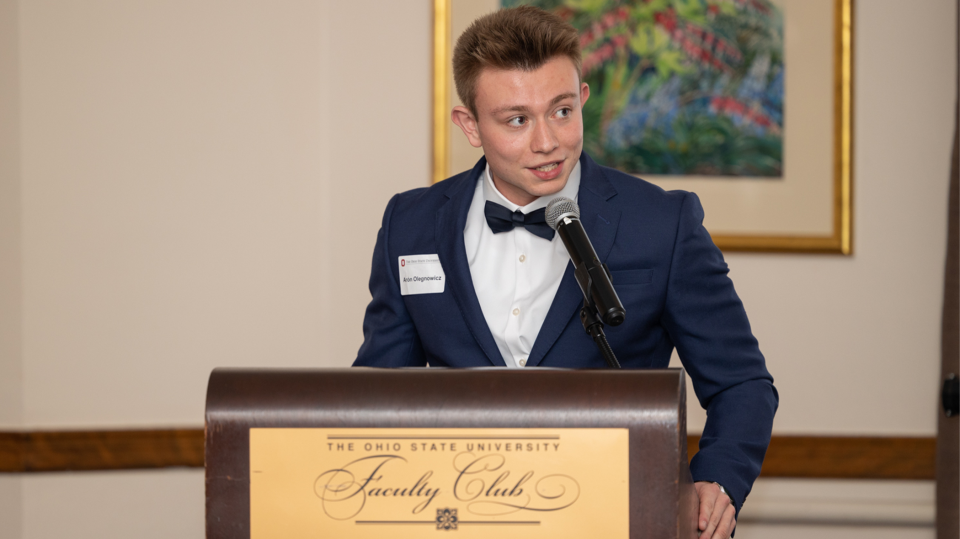 Arón Olegnowicz-Cruz speaking at the Faculty Club
